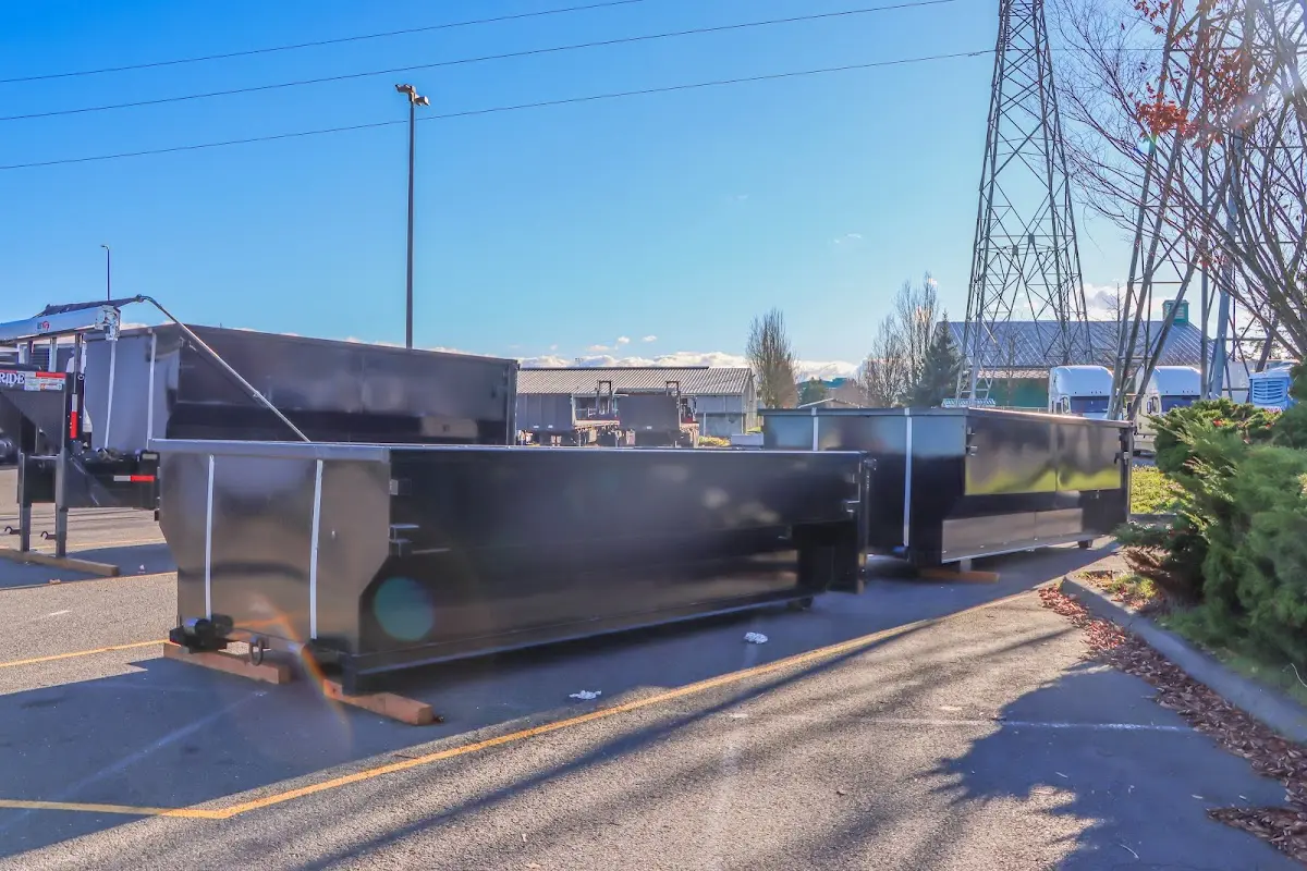 Roll-off dumpster ready for waste disposal at job site for 3 Yard Dumpster Rental in Harvest